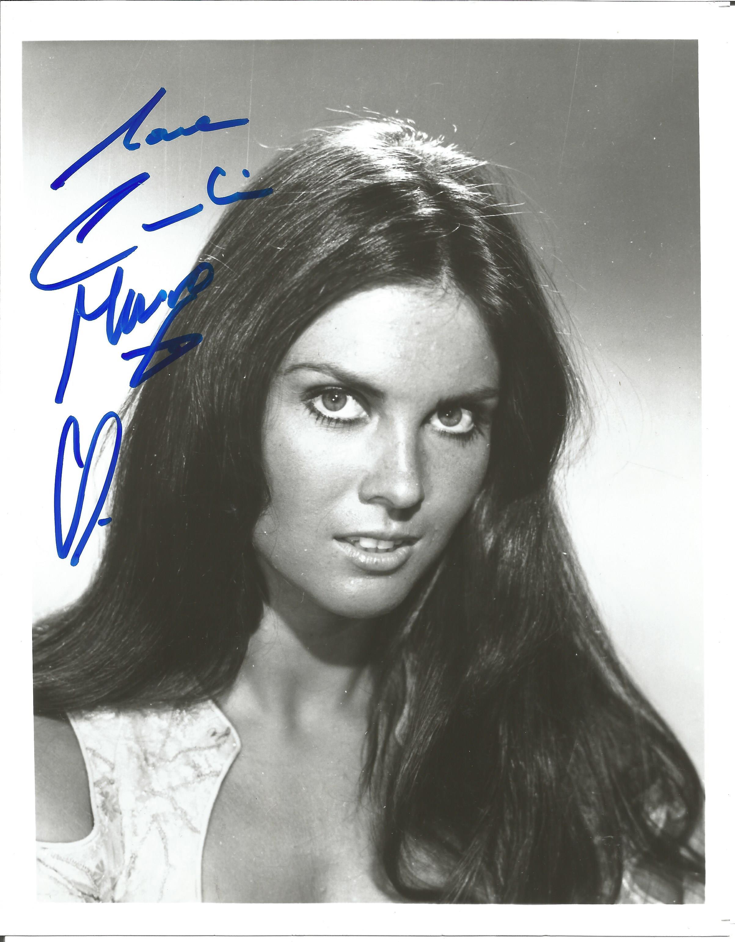 Caroline Munro signed 10x8 b/w photo. Good Condition. All signed pieces come with a Certificate of