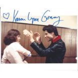 John Travolta and Karen Lynn Gorney authentic signed 10x8 colour photo. Good Condition. All signed