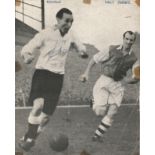 Stanley Matthews and Wally Barnes signed 10x8 b/w newspaper photo. Good Condition. All signed pieces