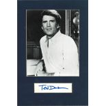 Ted Danson signed card mounted with 10 x 8 unsigned b/w photo to approx 16 x 12. Good Condition. All