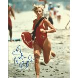 Nicole Eggert hand signed 10x8 photo. This beautiful hand-signed photo depicts Nicole Eggert as