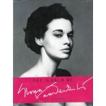 Gloria Vanderbilt and Wendy Goodman signed The World of Gloria Vanderbilt hardback book. Signed on