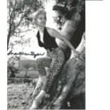 Martha Hyer signed 7x5 b/w photo. Good Condition. All signed pieces come with a Certificate of