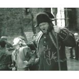 Lot of 2 Oliver! hand signed 10x8 photos. This beautiful set of 2 hand-signed photos depict Mark