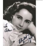 Elizabeth Taylor signed 7x5 b/w photo. Dedicated. Good Condition. All signed pieces come with a