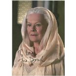 Judi Dench signed 12x8 colour photo. Good Condition. All signed pieces come with a Certificate of