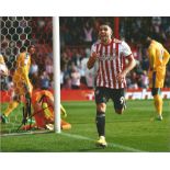 Neal Maupay Signed Brentford 8x10 Photo. Good Condition. All signed pieces come with a Certificate