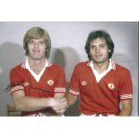 Football Autographed 12 x 8 photo, depicting Manchester United's Gordon McQueen welcoming new