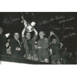 Football Autographed 12 x 8 Photo, Depicting Manchester United Captain Bobby Charlton Holding