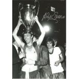 Football David Sadler 12x8 signed b/w photo pictured celebrating after Manchester Uniteds win in the