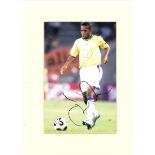 Football Robinho signed 16x12 mounted colour photo pictured in action for Brazil. Good condition