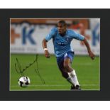 Football Nigel de Jong signed 10x12 mounted colour photo pictured in action for Holland. Good