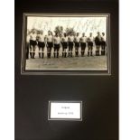 Football Uruguay vintage 1954 mounted b/w photo signed by 16 of the then Football world champions.