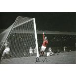 Football Denis Law 8x12 colour enhanced photo pictured scoring for Manchester United. Good condition