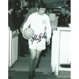 Football Johnny Giles 10x8 signed b/w photo pictured leading Leeds United out in the early