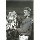 Autographed Gary Sprake photo, a superb image depicting the Leeds United goalkeeper posing with