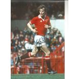Autographed Joe Jordan photo, a superb image depicting the Manchester United striker in full