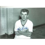 Autographed John Giles photo, a superb image depicting the Manchester United midfielder posing for