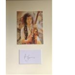 Brian May Queen Guitarist Signed 9x14 Mounted Display. Good Condition. All signed pieces come with a
