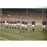 Autographed Denis Law photo, a superb image depicting Scotland players lining up shoulder to