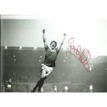 Autographed Gordon Hill photo, a superb image depicting Hill celebrating after scoring for