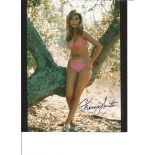 Nancy Sinatra signed 10x8 colour photo. Sang the theme tune for You only live Twice. Good Condition.