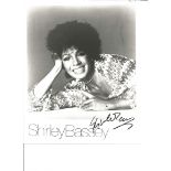 Shirley Bassey signed 10x8 b/w photo. Sang the theme tunes for 3 James Bond films. Good Condition.