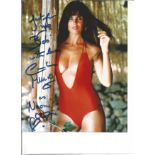 Caroline Munro signed 10x8 colour swimsuit photo. She has added her character name Naomi 007 to