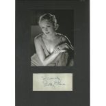 Sally Eilers signed piece with b/w photo mounted to 10 x 8 inches overall. She made her film debut