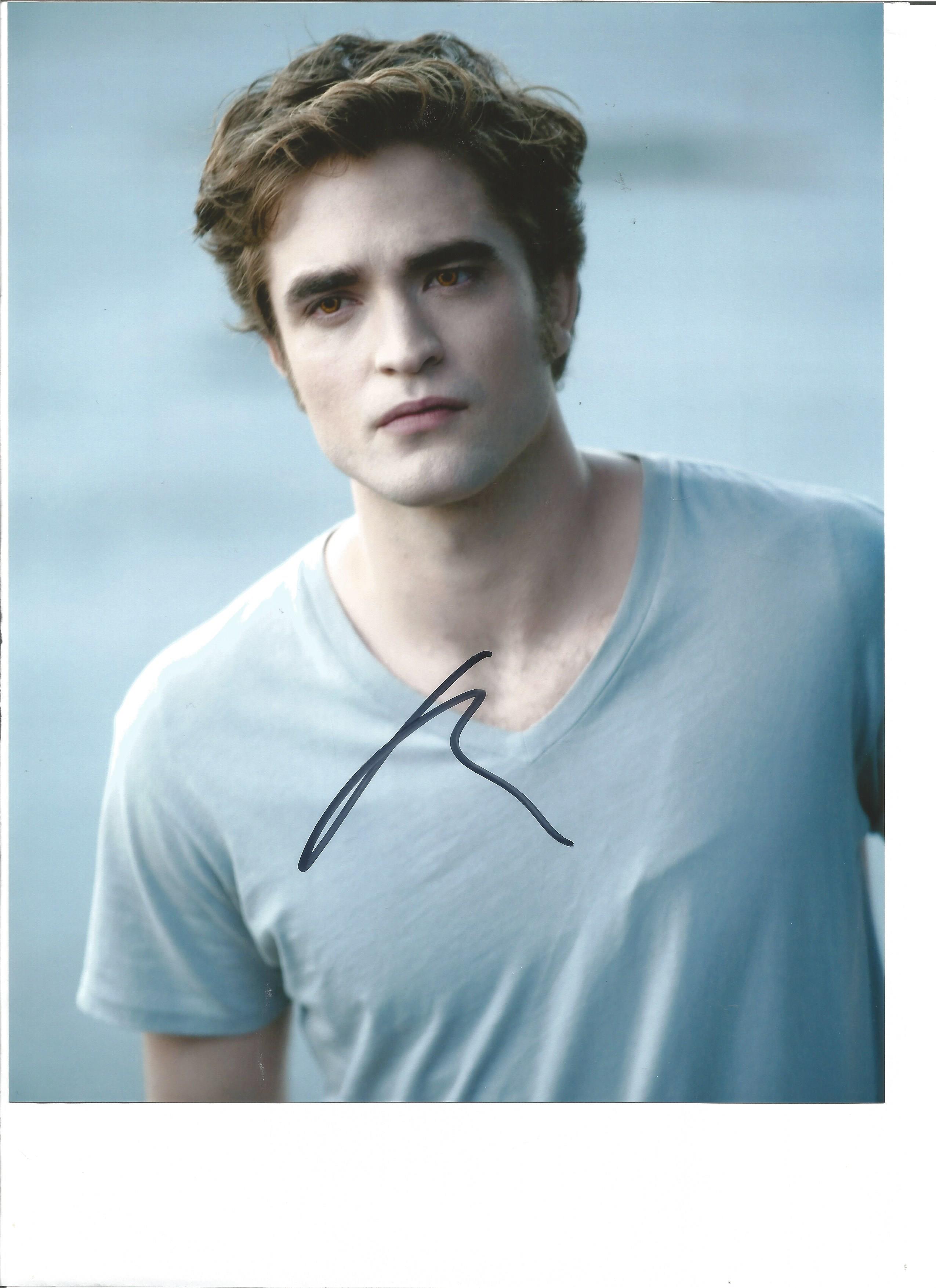 Robert Pattinson signed 10x8 colour photo. Good Condition. All signed pieces come with a Certificate