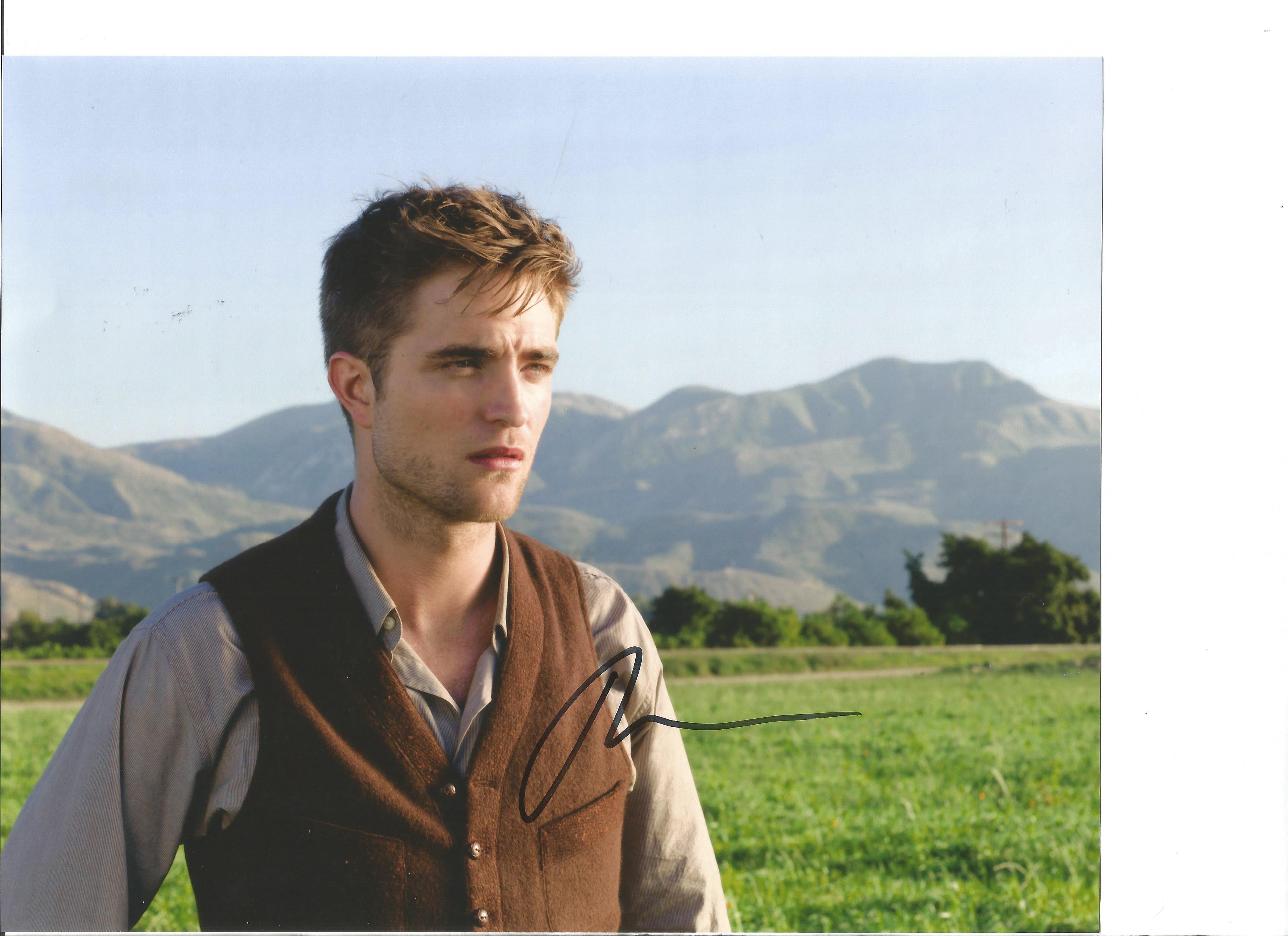 Robert Pattinson signed 10x8 colour photo. Good Condition. All signed pieces come with a Certificate