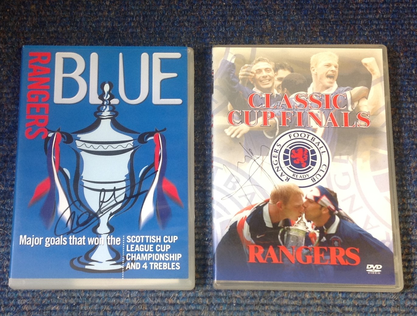 Rangers FC 2 DVD's signed collection. 1 signed by George Albertz the other unidentified. Good