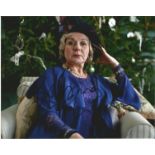 Barbara Flynn signed 10x8 portrait colour photo sitting and in purple dress. Good Condition. All