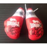 Marvellous Marvin Hagler signed miniature boxing gloves. Good Condition. All signed pieces come with