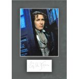 Paul McGann signature piece mounted below colour photo from Dr Who. Approx. overall size 16x12.