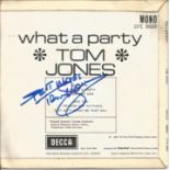 Tom Jones signed 45rmp record What a Party. Good Condition. All signed pieces come with a