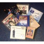 Signed music collection. Includes 7 signed cd sleeves. CD's included and one cassette tape. Some