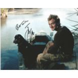 Jude Law signed 10x8 lovely colour photo with a dog on boat together. Good Condition. All signed