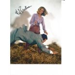 Honor Blackman signed 10x8 colour James Bond photo. Good Condition. All signed pieces come with a