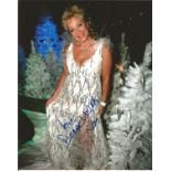 Denise Welch signed 10x8 colour photo full body shot with Christmassy background. Good Condition.