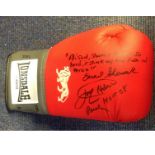 Lonsdale Boxing Glove signed by Earnie Shavers and Larry Holmes. Good Condition. All signed pieces