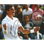 Milos Raonic Signed Tennis 8x10 Photo. Good Condition. All signed pieces come with a Certificate