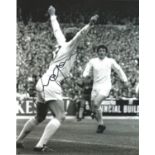 Mick Jones signed 10x8 b/w photo pictured celebrating while playing for Leeds United. Good