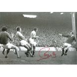 Sammy Mcilroy signed 8x12 b/w photo pictured in action for Manchester United. Good Condition. All