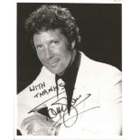 Tom Jones signed 10x8 b/w photo. Good Condition. All signed pieces come with a Certificate of