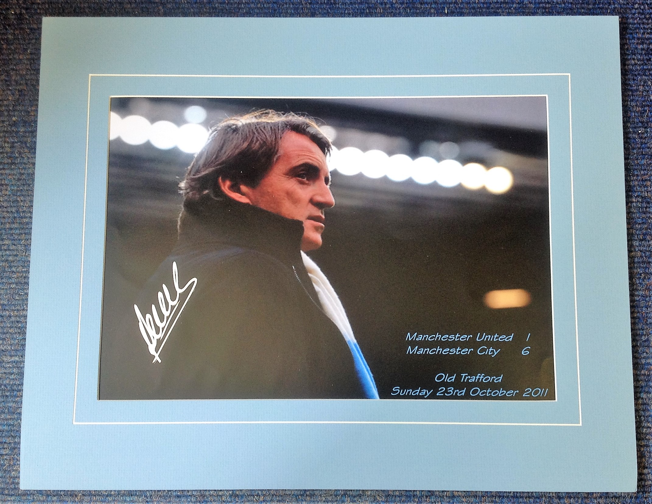 Roberto Mancini signed colour photo as Man City manager. Mounted to approx 16x20 size. Good