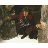 Tom Baker Dr. Who hand signed 10x8 photo. This beautiful hand signed photo depicts Tom Baker as