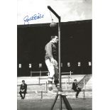 Autographed JOE McBRIDE photo, a superb image depicting the Celtic centre forward demonstrating