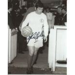 Johnny Giles signed 10x8 b/w photo pictured leading Leeds United out. Good Condition. All signed