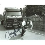 Geoff Capes signed 8x10 b/w photo pictured in action in Worlds Strongest man contest. Good